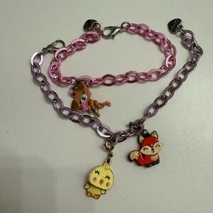 Charm It Pink and Purple Kids Charm Bracelets with three charms
